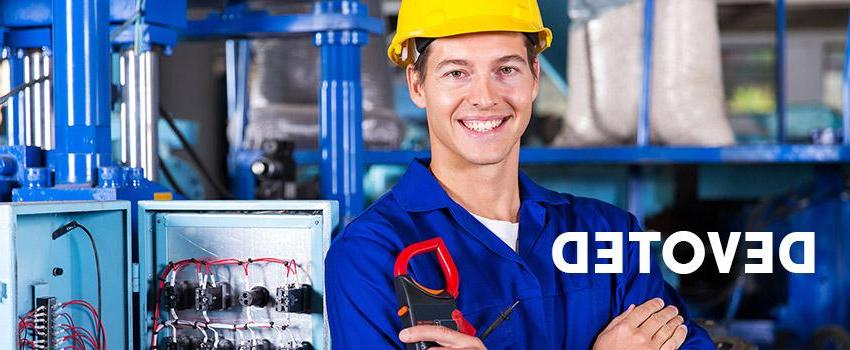 Devoted text over image of a worker with hardhat on.