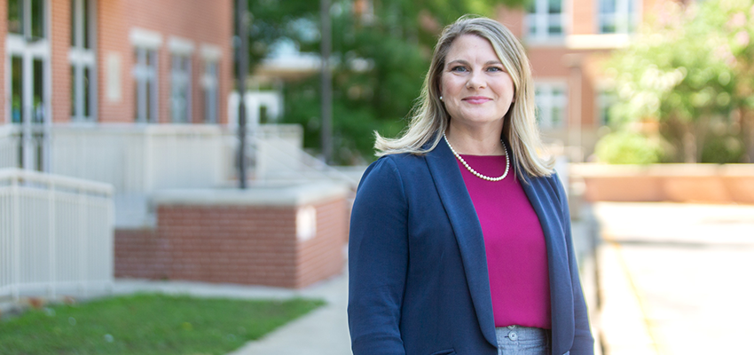 Dr. Smith in front of HAHN