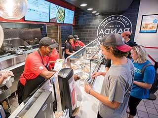 Students ordering lunch at food court